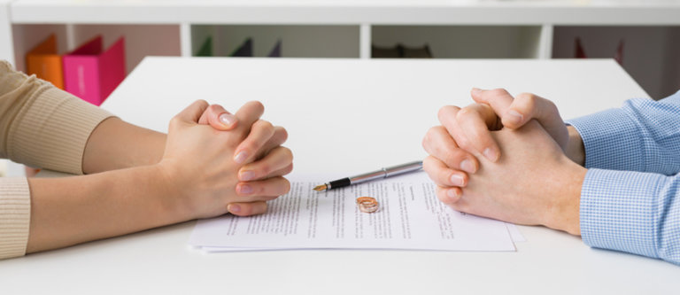 Divorcing couple with legal document